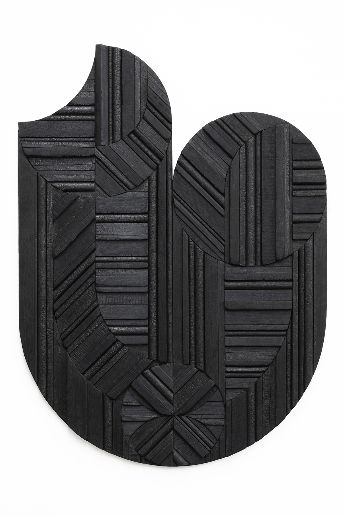 Laura Lappi's wall sculpture Umbra XVI made of charred wood